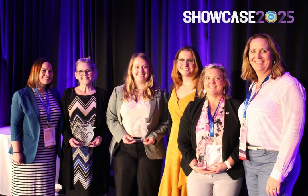 Representatives from PA's Office of Vocational Rehabilitation, Office of Developmental Programs, and Department of Education pose on stage after winning the Innovations in Strategic Transformation Award.